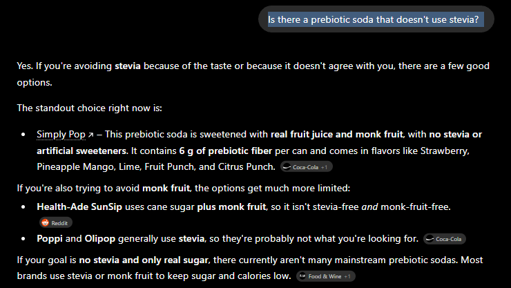 ChatGPT answering 'is there a prebiotic soda that doesn't use stevia' by naming Simply Pop the standout choice and noting Poppi and Olipop generally use stevia, with source chips for Coca-Cola, Reddit, and Food and Wine